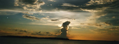 Rob Jones in front of a dramatic golden-hour sunset sky.